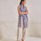 Model is wearing the Celestial Chantilly Pashmina Shawl in powder purple.