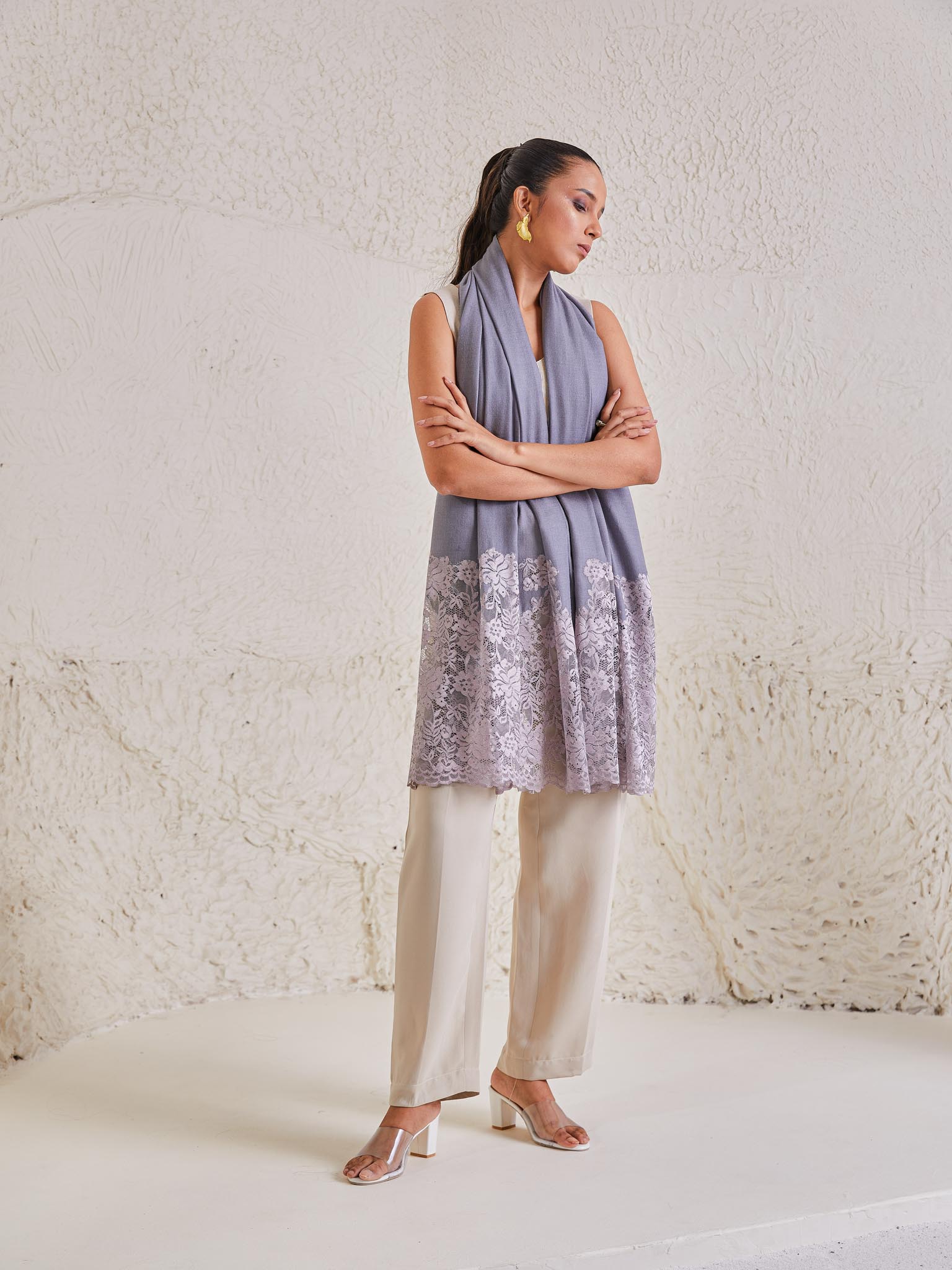 Model is wearing the Celestial Chantilly Pashmina Shawl in powder purple.