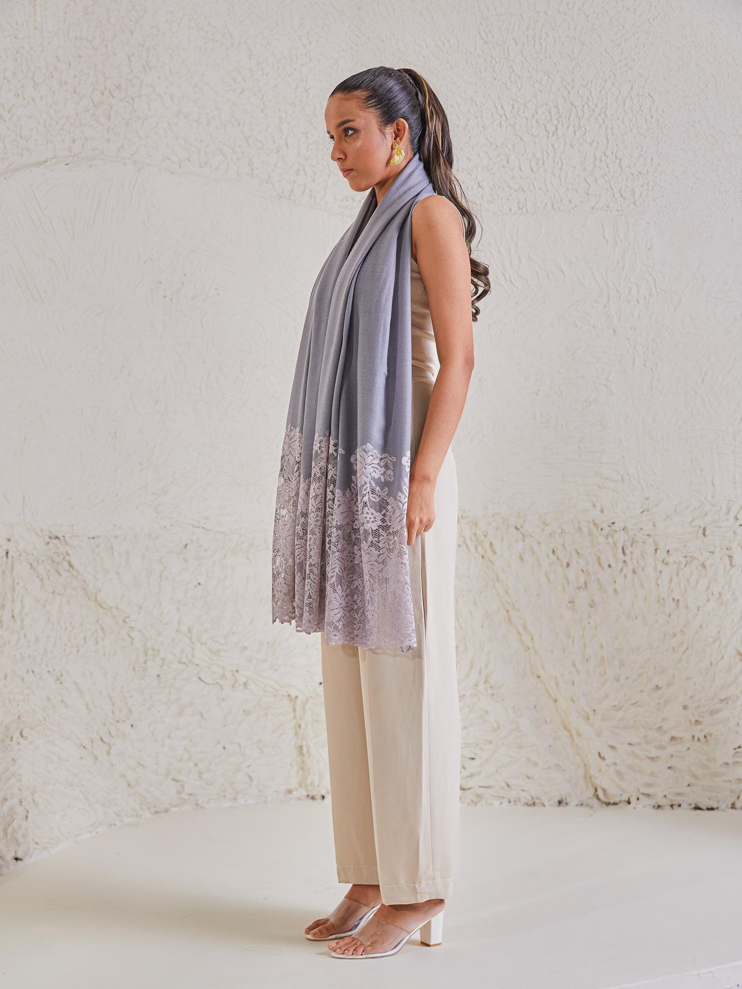 Model is wearing the Celestial Chantilly Pashmina Shawl in powder purple.