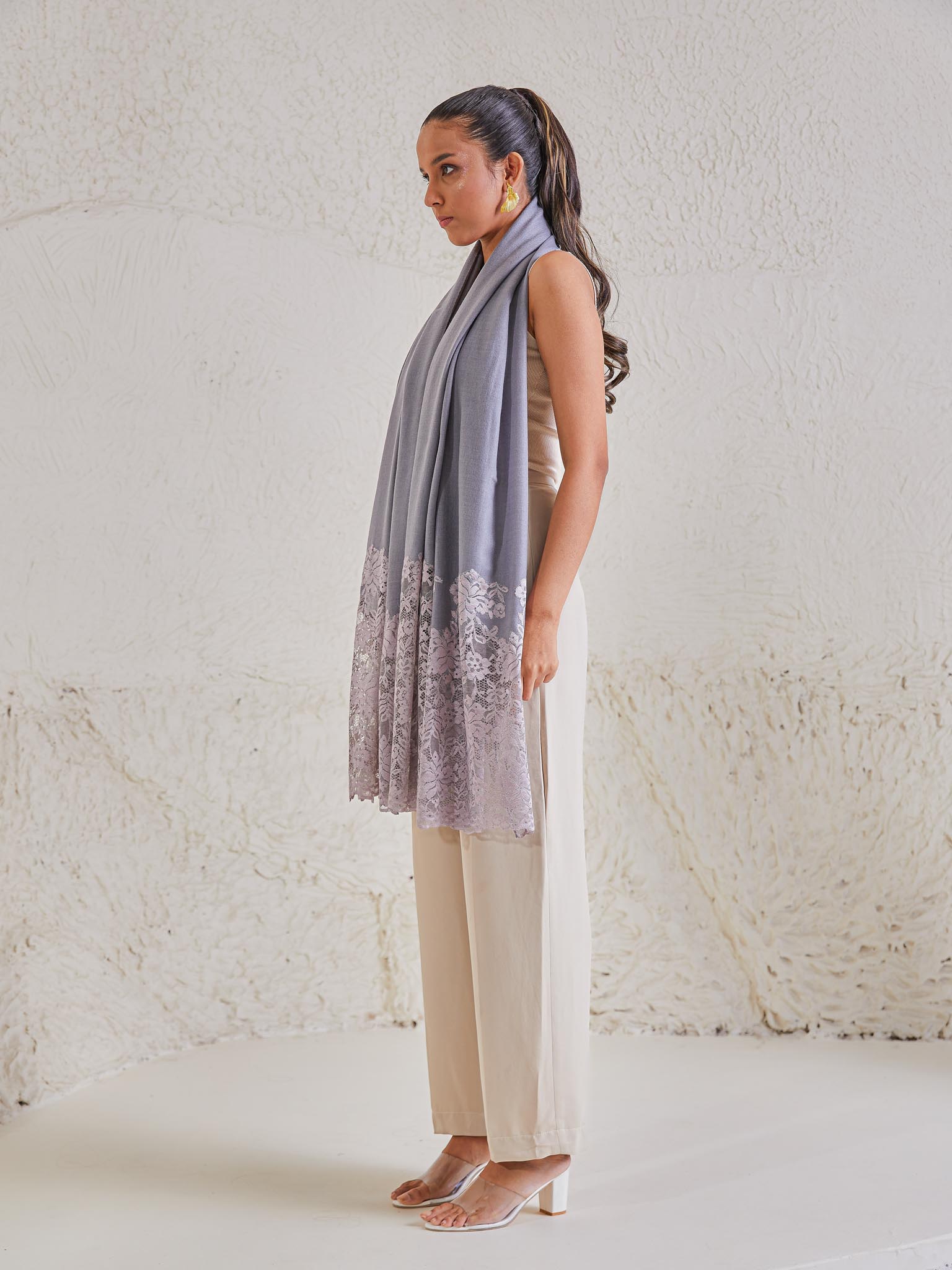 Model is wearing the Celestial Chantilly Pashmina Shawl in powder purple.