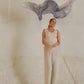 Model is wearing the Celestial Chantilly Pashmina Shawl in powder purple.