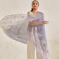 Model is wearing the Celestial Chantilly Pashmina Shawl in powder purple.