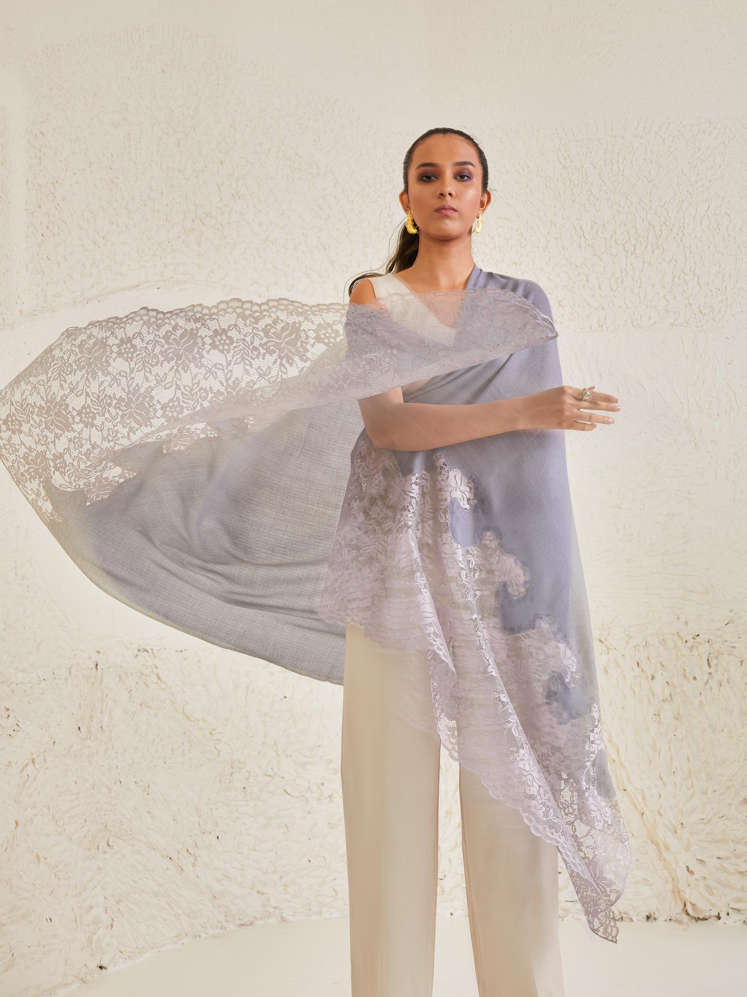 Model is wearing the Celestial Chantilly Pashmina Shawl in powder purple.