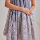 Model is wearing the Celestial Chantilly Pashmina Shawl in powder purple.