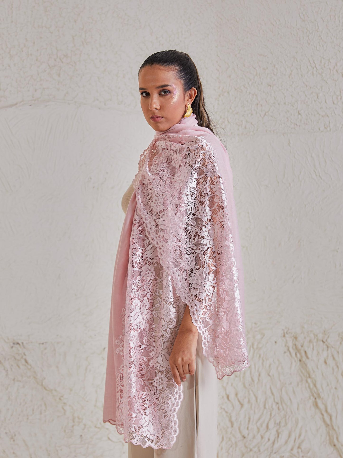 Model is wearing the Celestial Chantilly Pashmina Stole from shaza in baby pink.
