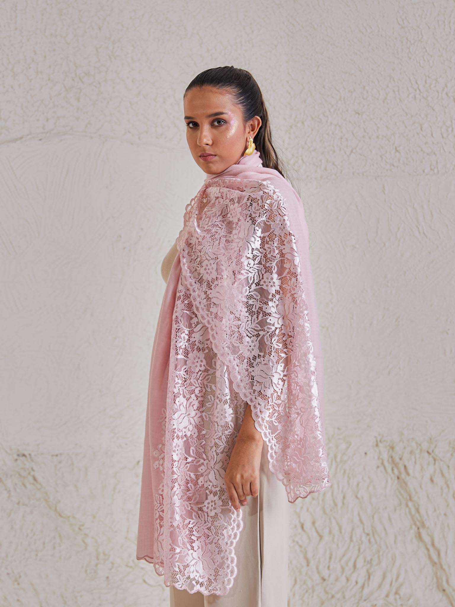 Model is wearing the Celestial Chantilly Pashmina Stole from shaza in baby pink.