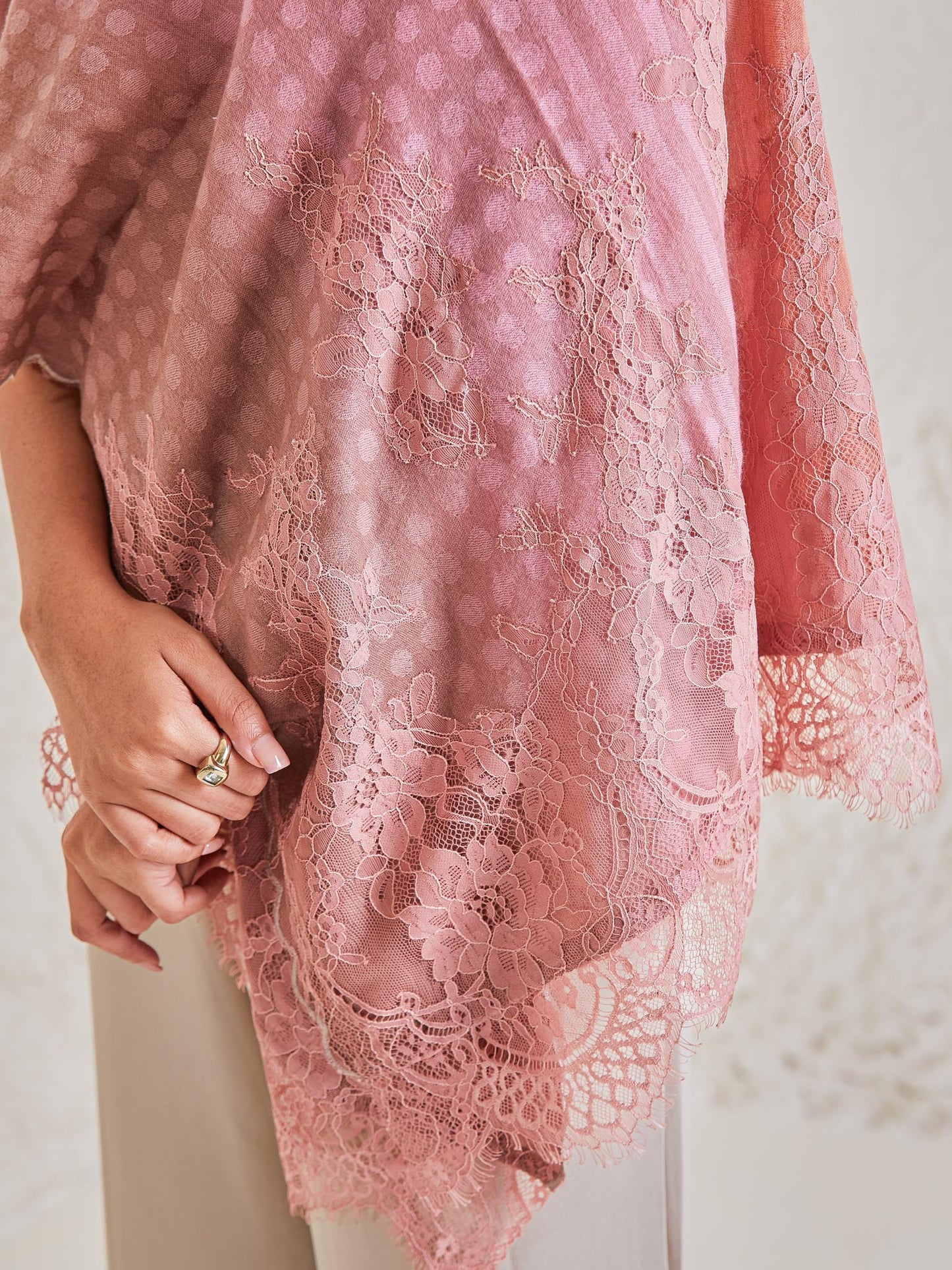 Model is wearing the Celestial Chantilly Pashmina Stole from shaza in baby pink and peach.
