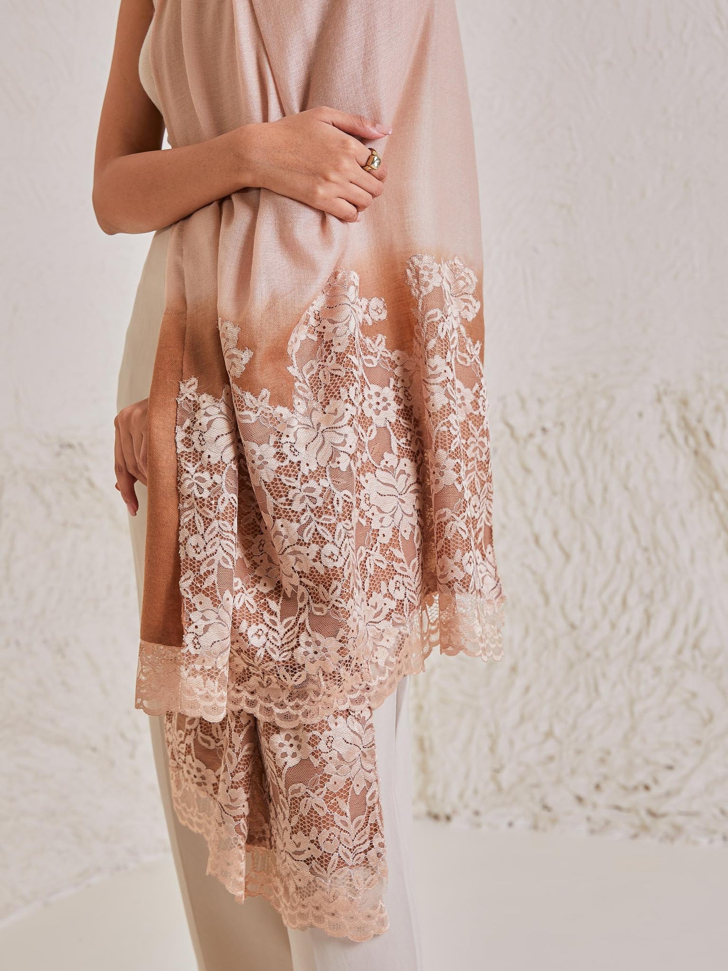 Model is wearing the Celestial Chantilly Pashmina Stole from shaza in gold-brown ombre..