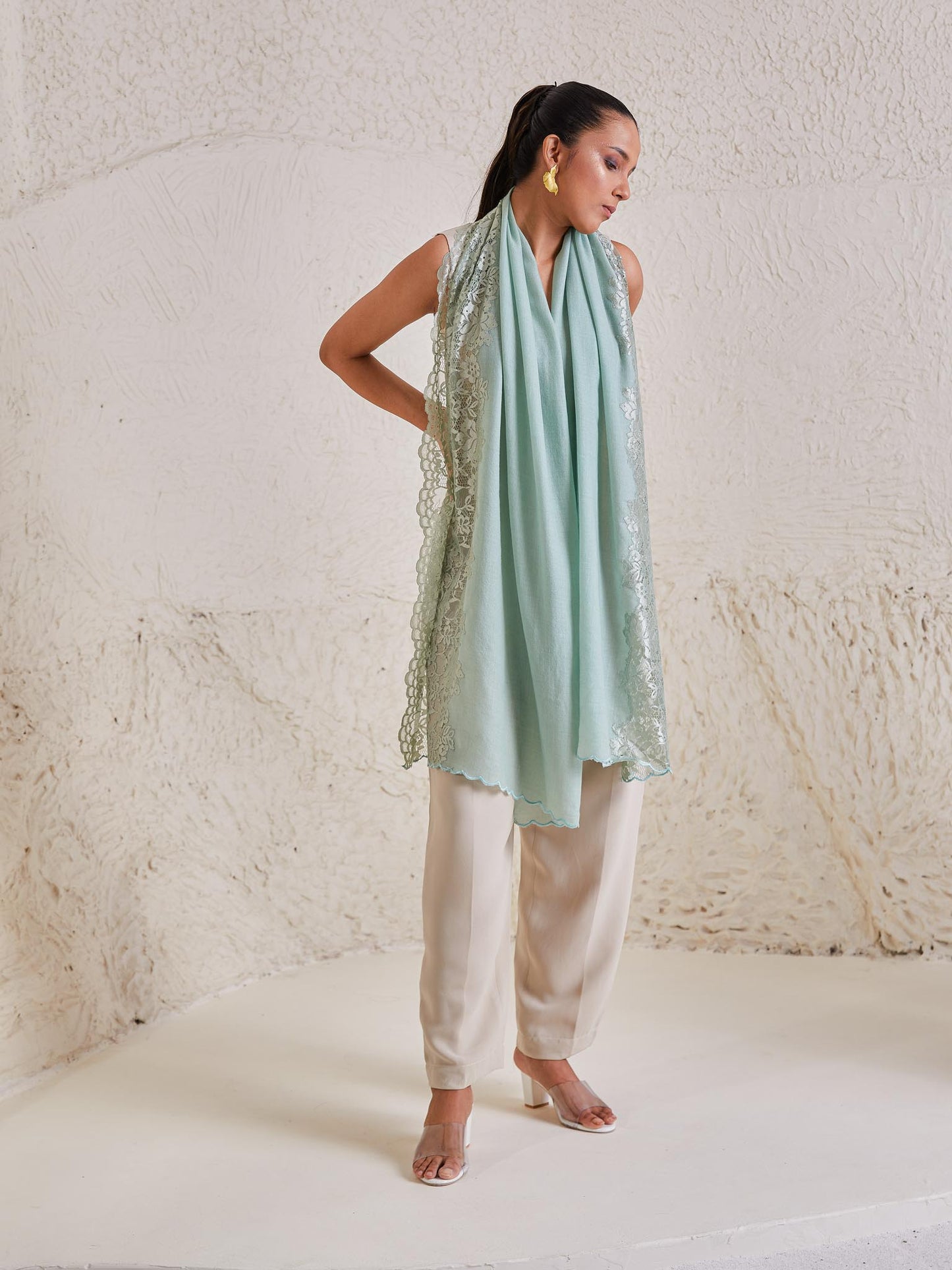 Model is wearing the Celestial Chantilly Pashmina Stole from shaza in sea green..
