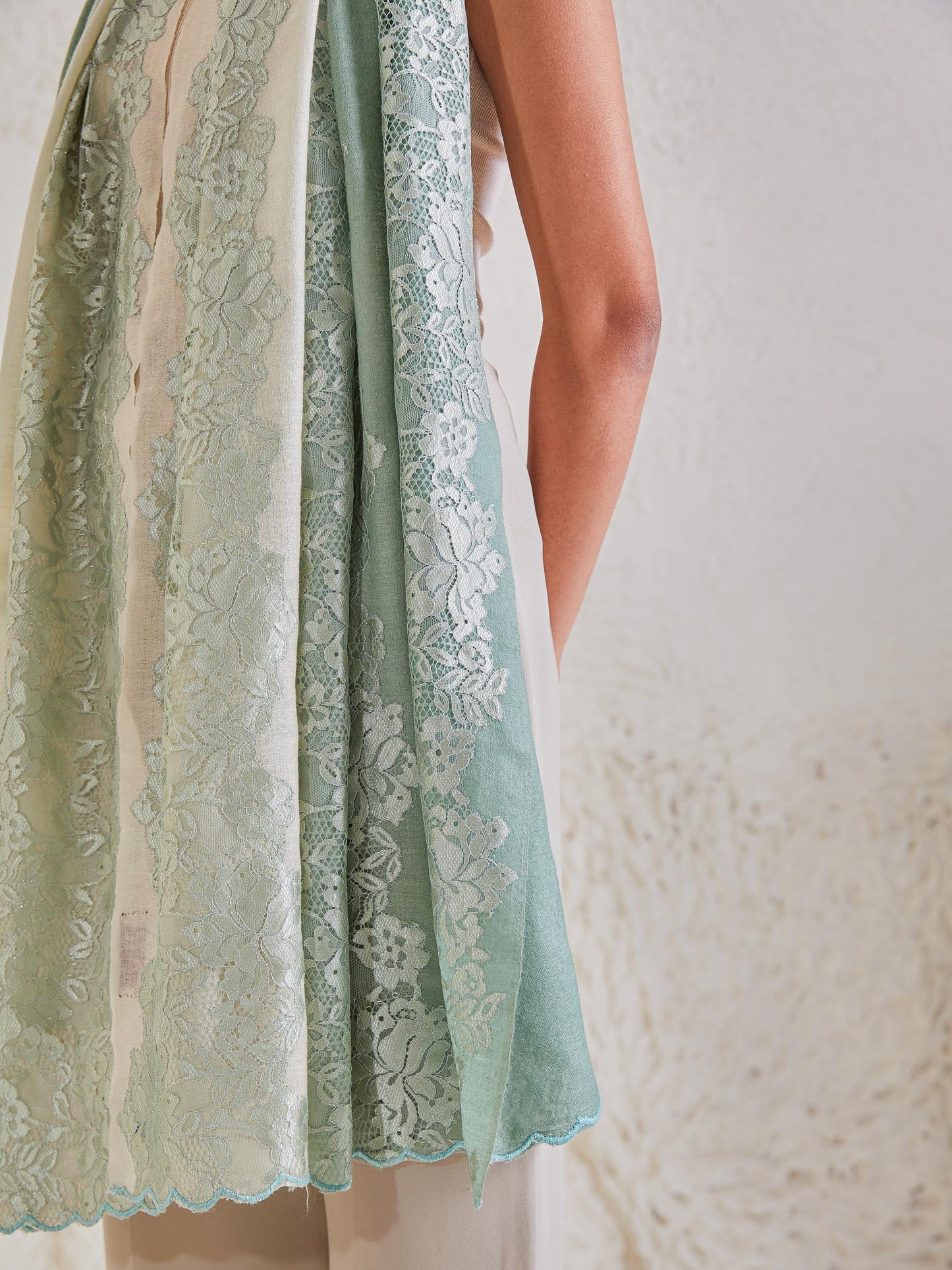 Model is wearing the Celestial Chantilly Pashmina Stole from shaza in sea green ombre.