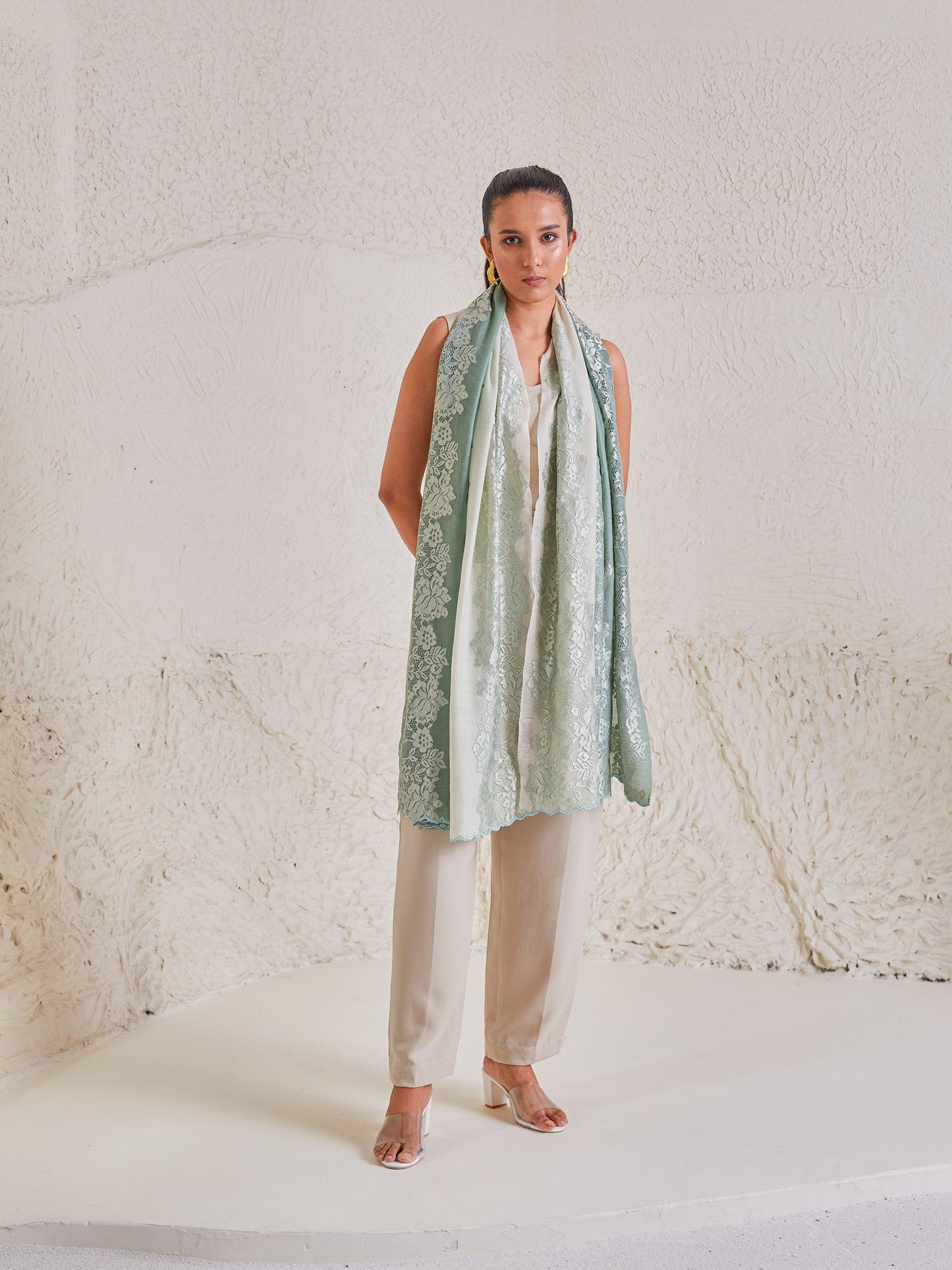 Model is wearing the Celestial Chantilly Pashmina Stole from shaza in sea green ombre.