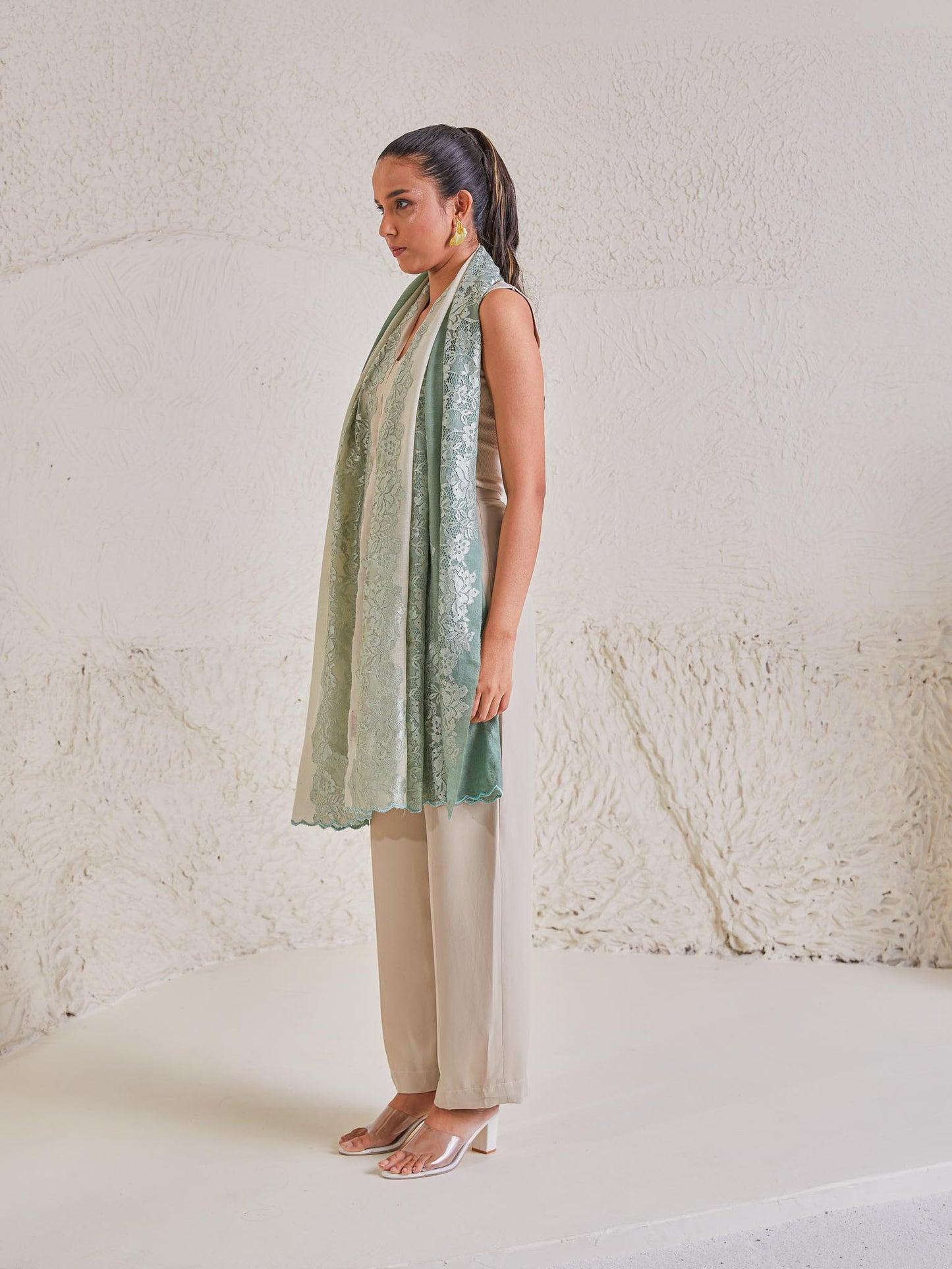 Model is wearing the Celestial Chantilly Pashmina Stole from shaza in sea green ombre.