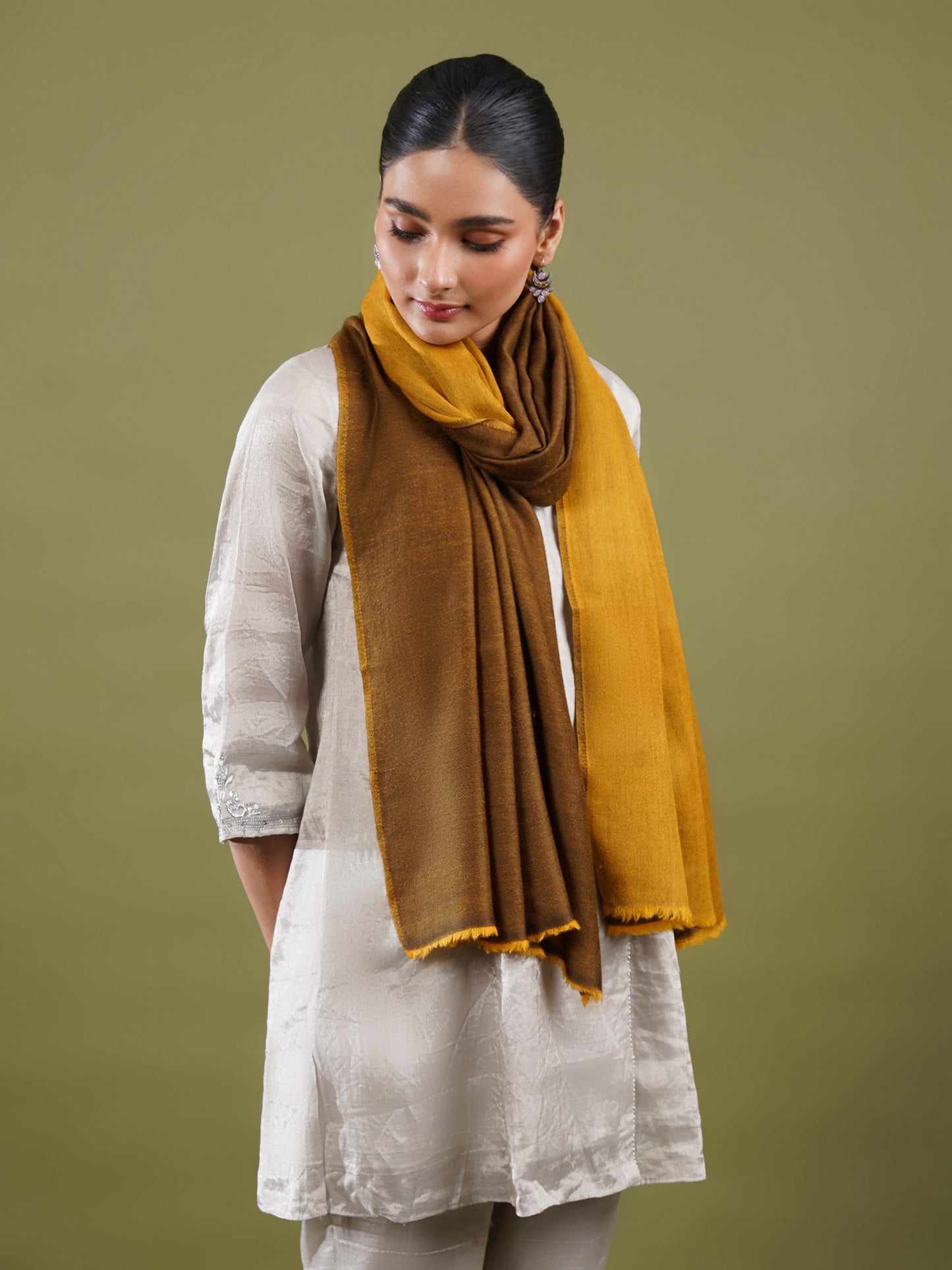 Woman wearing a mustard yellow Reversible Stole