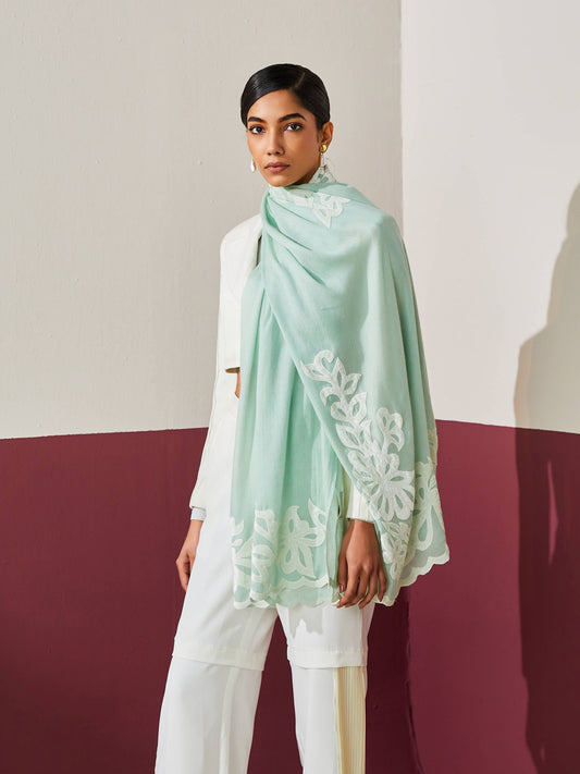 Model is wearing a mint Velvet affair cashmere stole with white applique from Shaza.