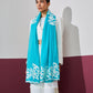 Model is wearing a firozi blue Velvet affair cashmere stole with white applique from Shaza.