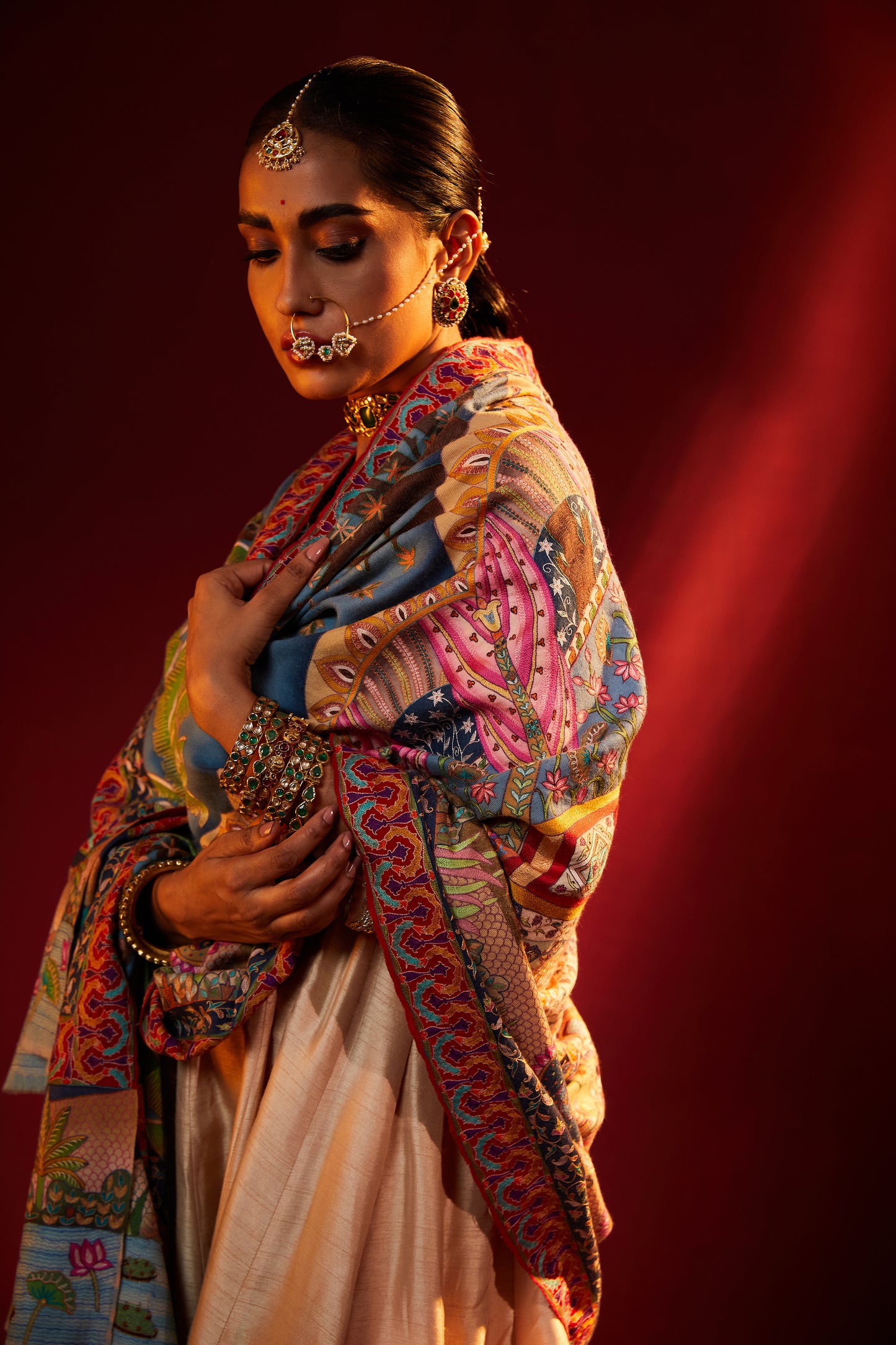 Model is wearing Nathdwaraji Pashmina Shawl from shaza.
