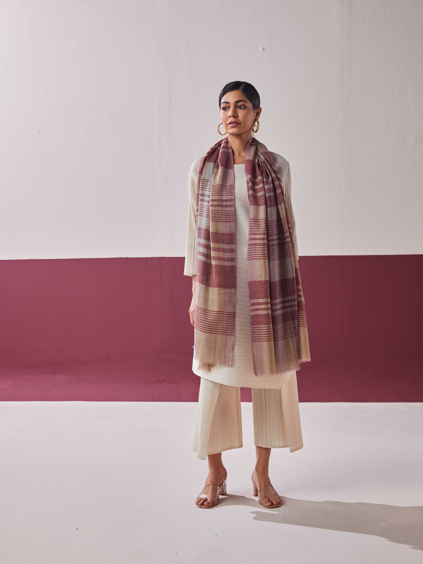 Model is wearing a pashmina striped stole from Shaza.