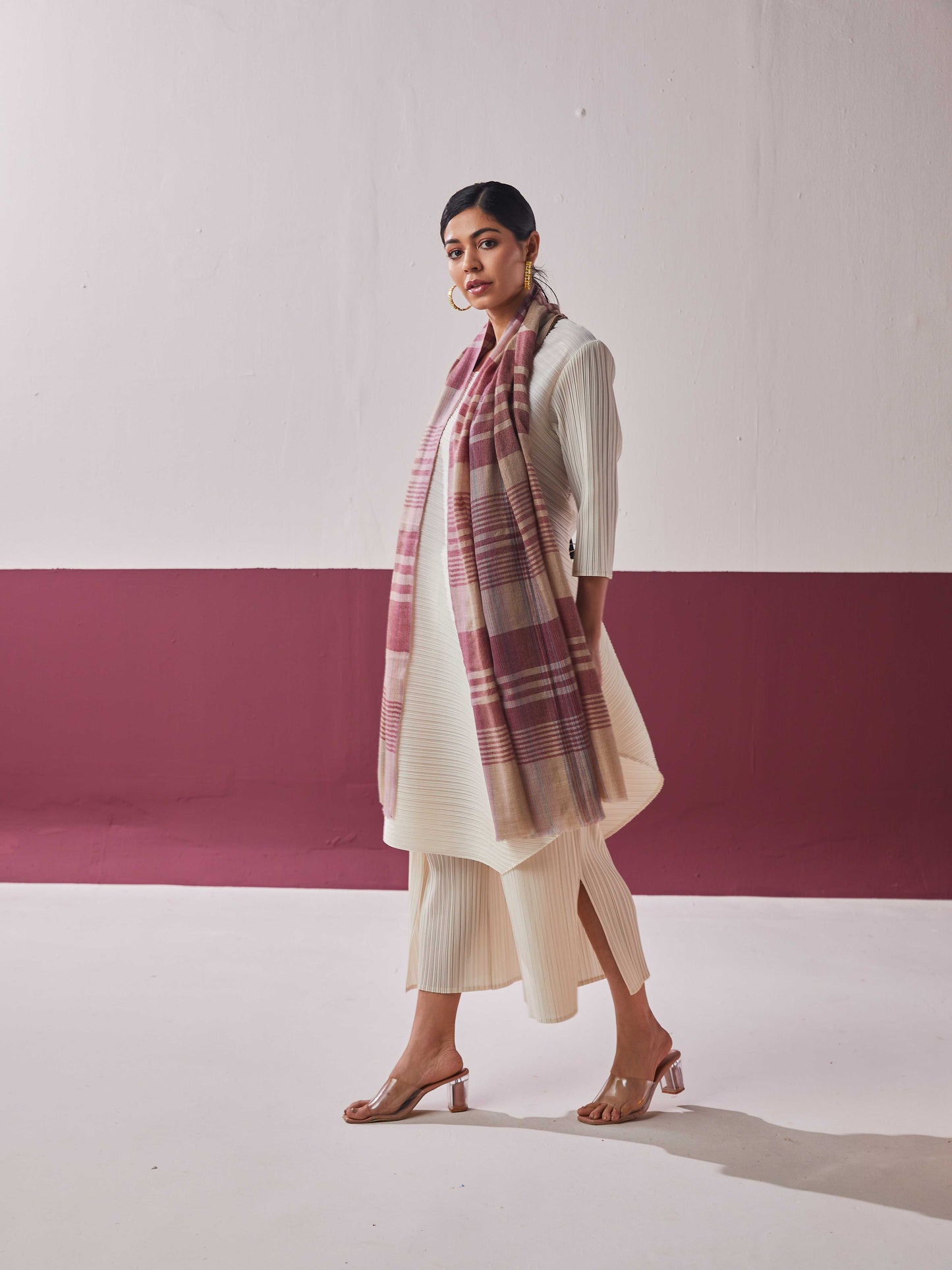 Model is wearing a pashmina striped stole from Shaza.