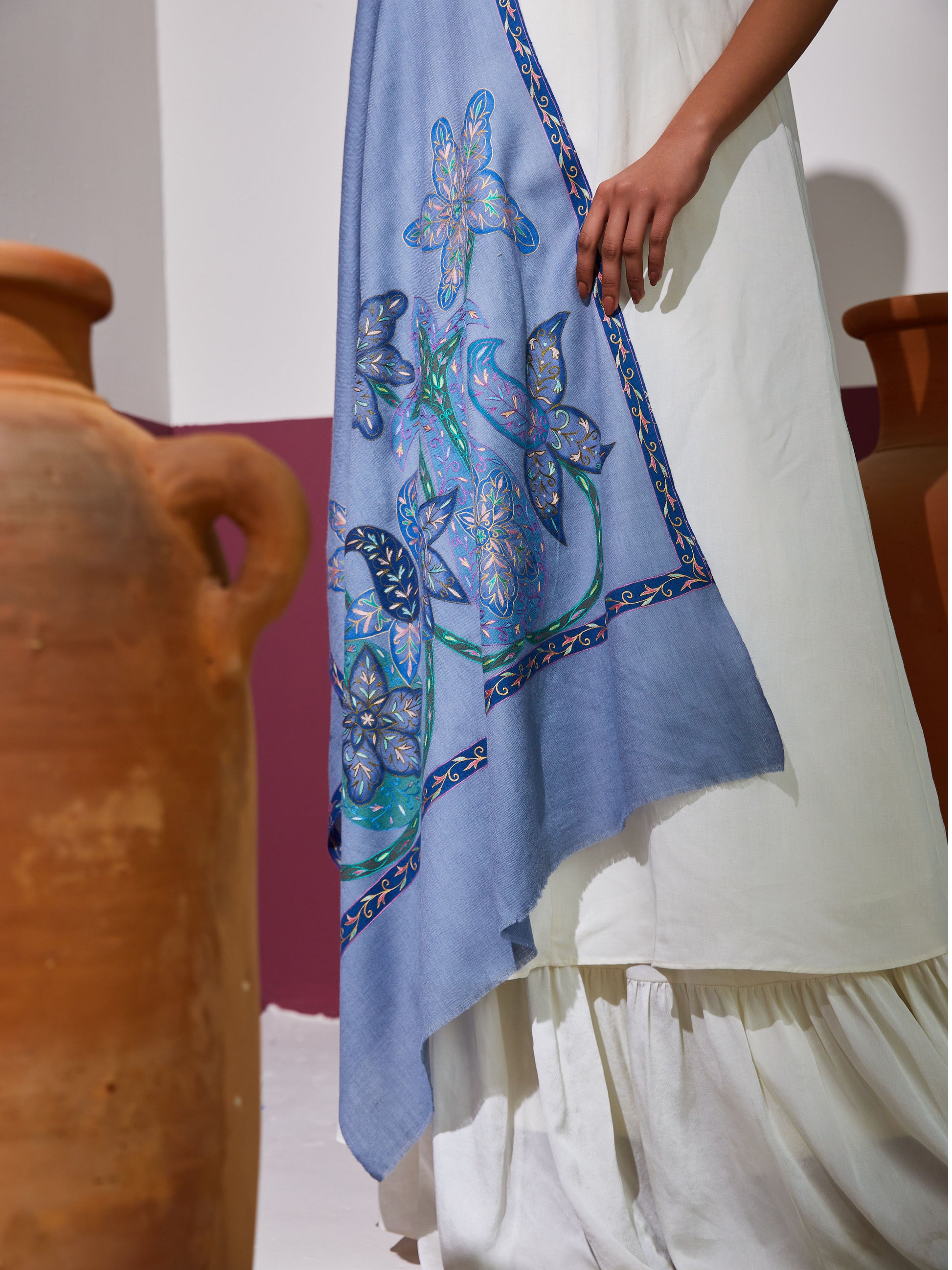 Model is wearing a Pasmina Kalamkari Border Stole in the colour cornflower blue from Shaza.