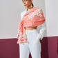 Model is wearing a baby pink Velvet affair cashmere stole with white applique from Shaza.