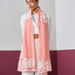 Model is wearing a baby pink Velvet affair cashmere stole with white applique from Shaza.