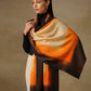 Model is wearing a Saya Ombre stole from Shaza, in the colour  Earth: Beige, orange and black