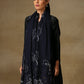 Model is wearing a Vineyard Zaywar stole featuring cutwork vine pattern bordered with zari details and hand embellished with fine swarovski, in a midnight blue colour.