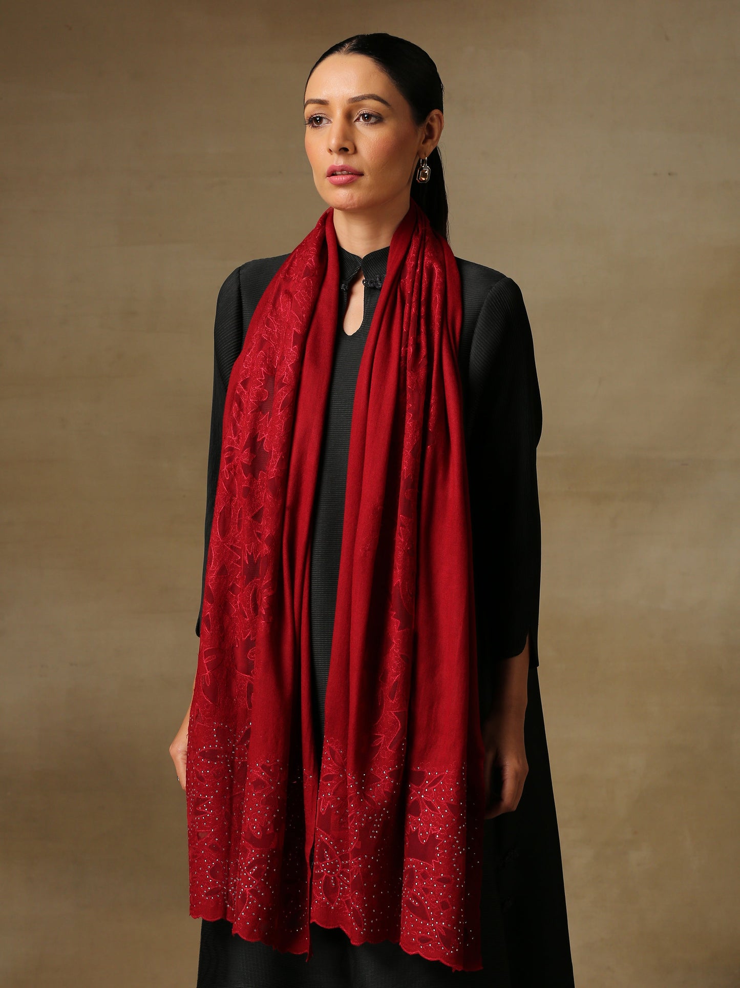 Model is wearing Cutwork Zaywar stole from Shaza in red..