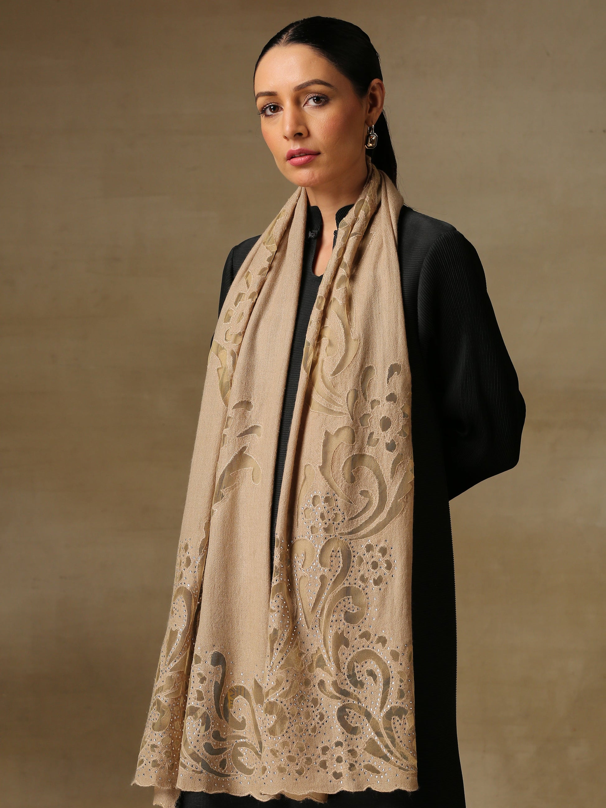 Model is wearing Cutwork Zaywar stole from Shaza in gold..
