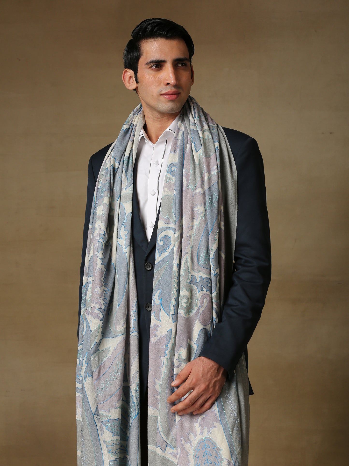 Model is wearing the Men's Kalamkari Khaka Dushala from Shaza.
