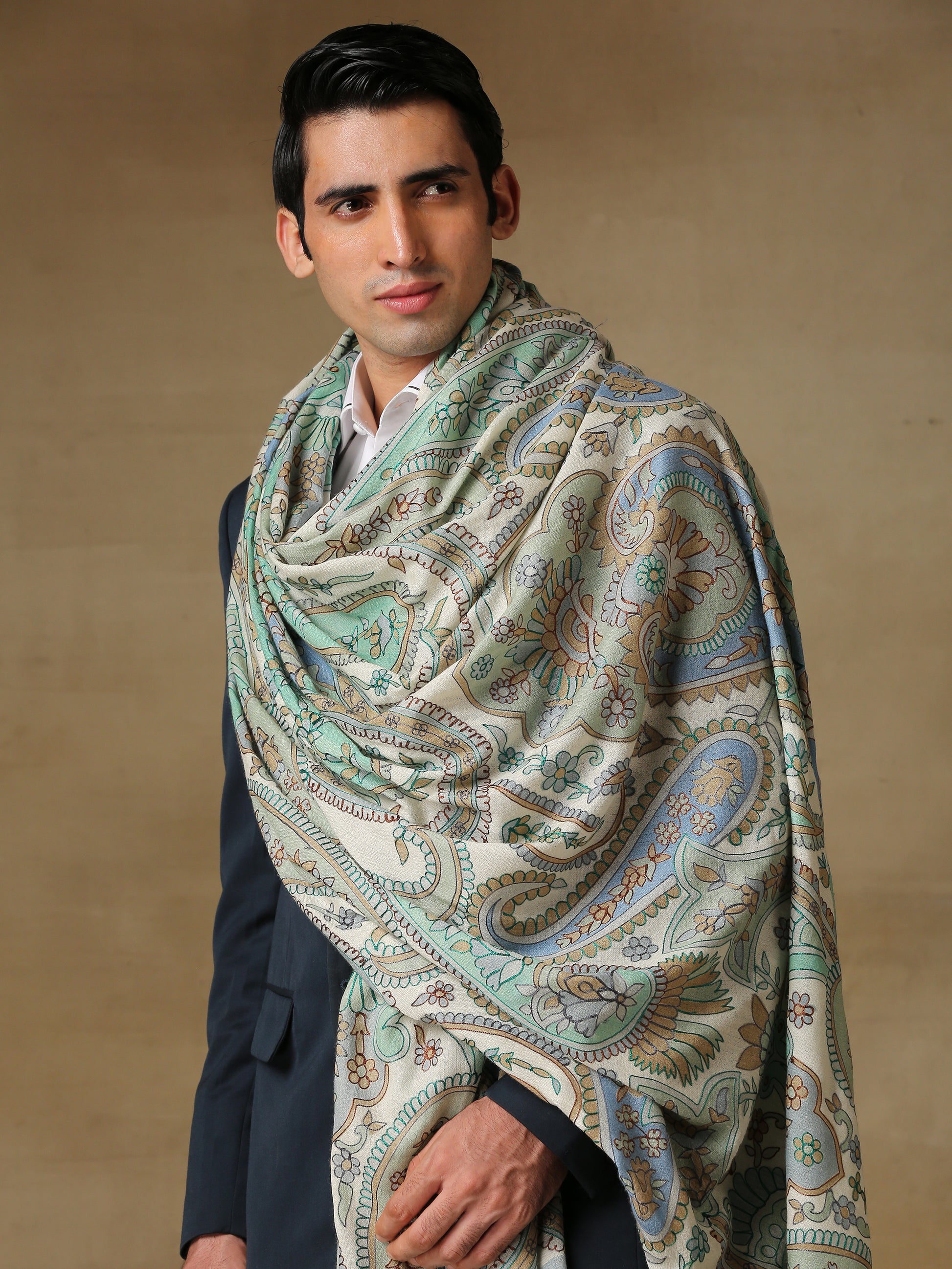Model is wearing the Men's Kalamkari Khaka Dushala from Shaza.