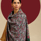 Model is wearing a Needlework pashmina shawl from shaza in a green colour.