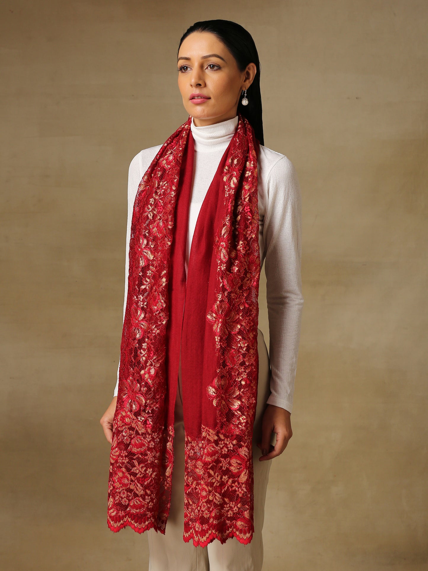 Model is wearing Celestial Chantilly stole from Shaza in red.