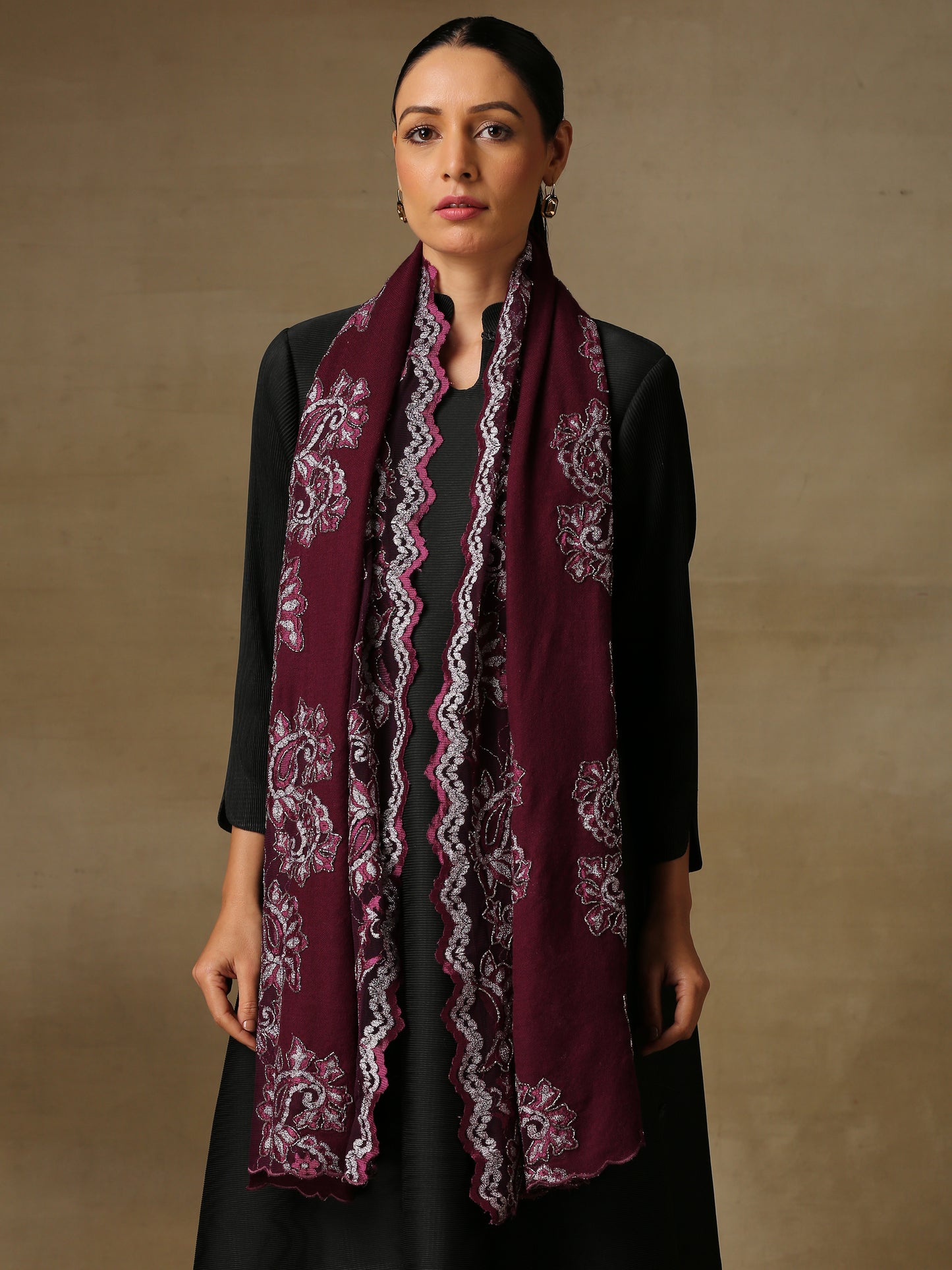 Model is wearing a Chantilly Magnificent stole in the colour Deep Wine from Shaza.