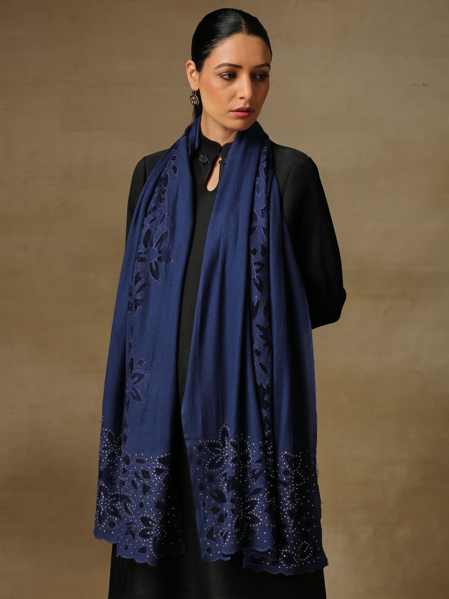 Model is wearing Cutwork Zaywar stole from Shaza in navy blue.