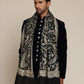 Man wearing a black pashmina shawl