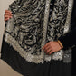 Man wearing a black pashmina shawl