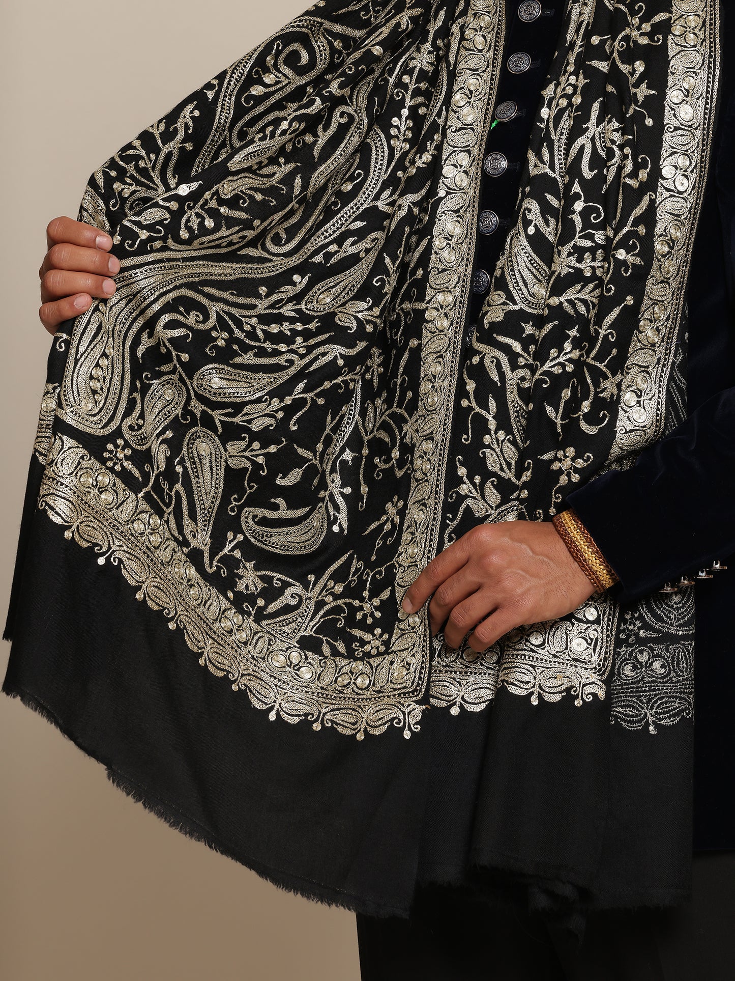 Man wearing a black pashmina shawl