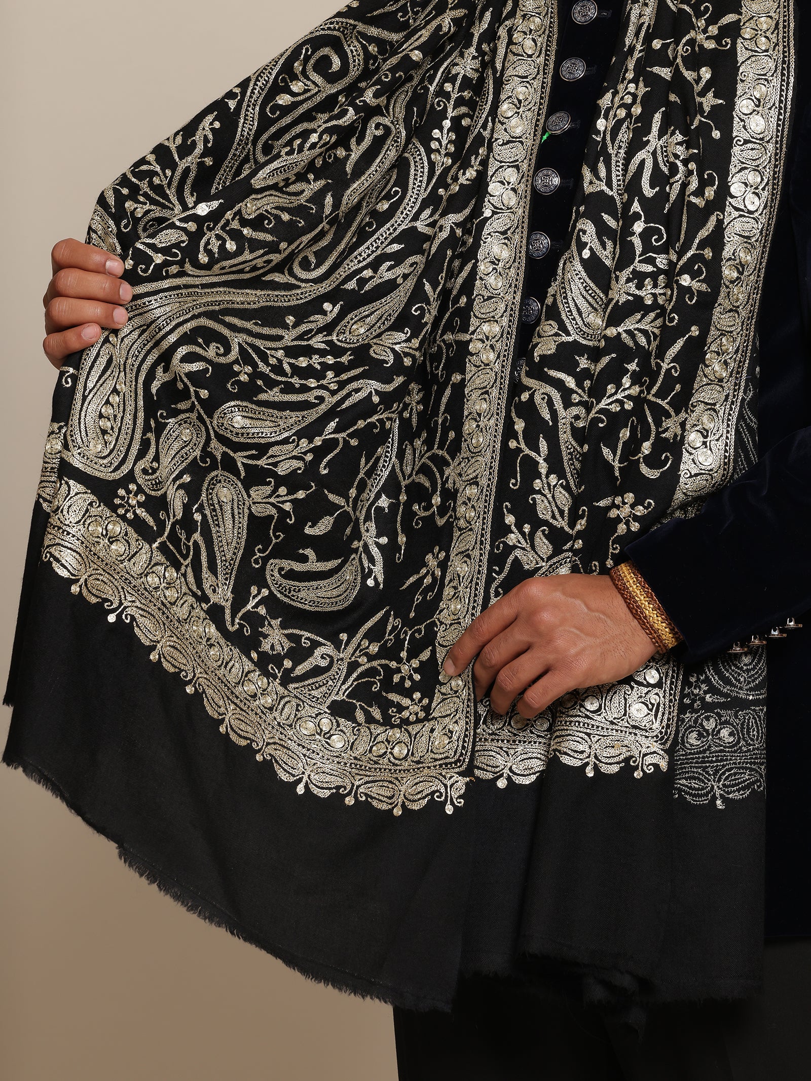 Man wearing a black pashmina shawl