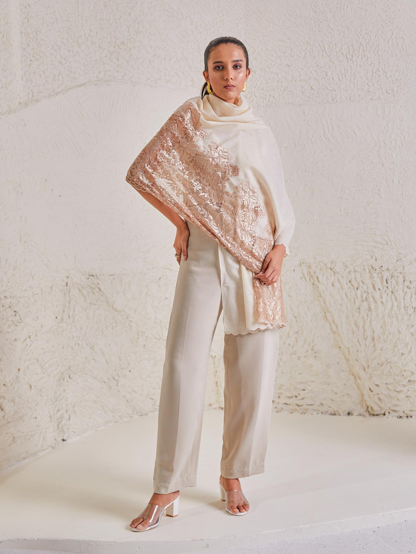 Model is wearing the Celestial Chantilly Pashmina Shawl in white and rose gold.