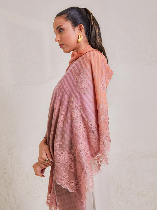 Model is wearing the Celestial Chantilly Pashmina Stole from shaza in baby pink and peach. 