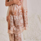 Model is wearing the Celestial Chantilly Pashmina Stole from shaza in gold-brown ombre.. 