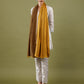 Woman wearing a mustard yellow Reversible Stole