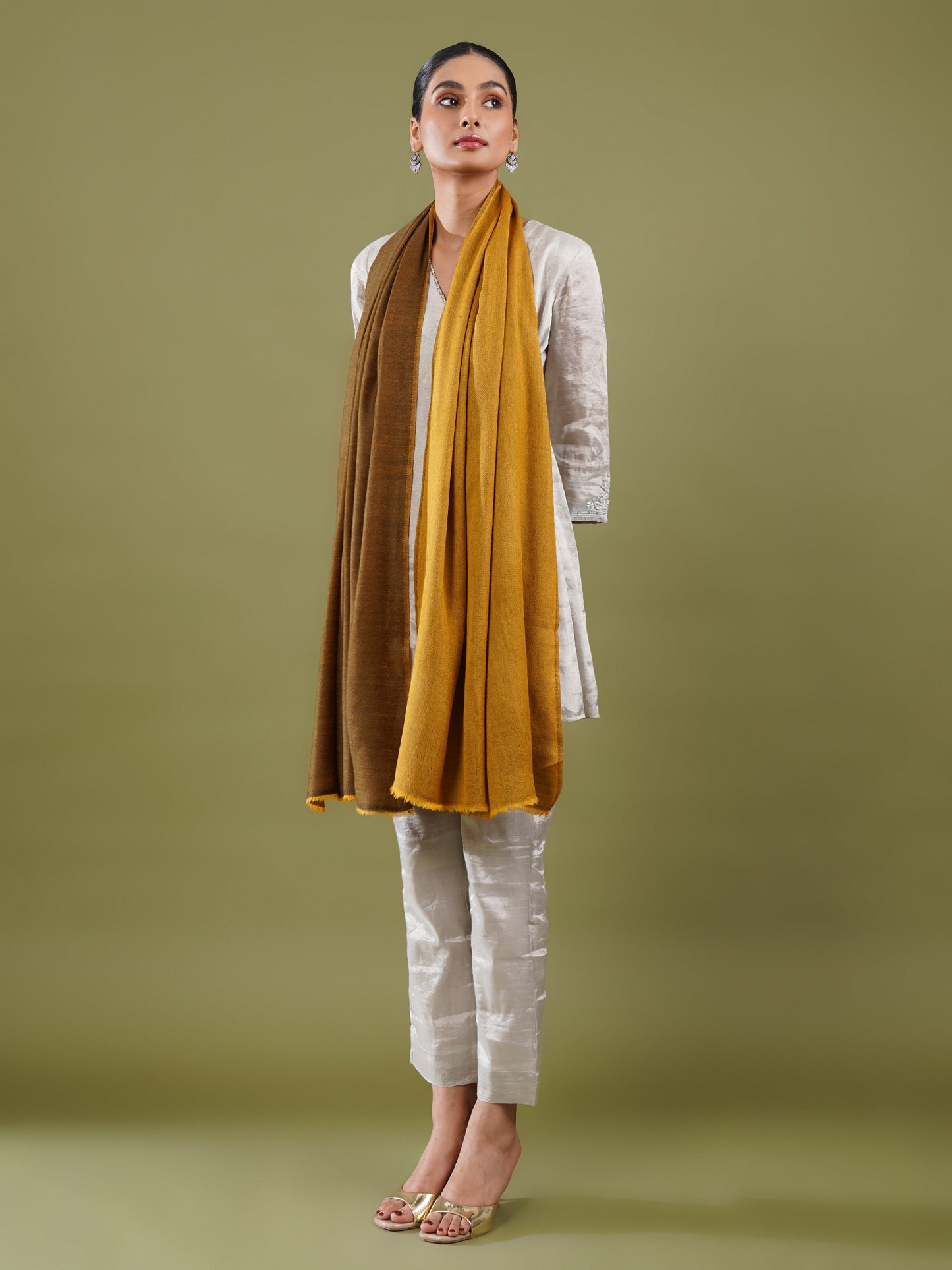 Woman wearing a mustard yellow Reversible Stole