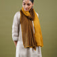 Woman wearing a mustard yellow Reversible Stole