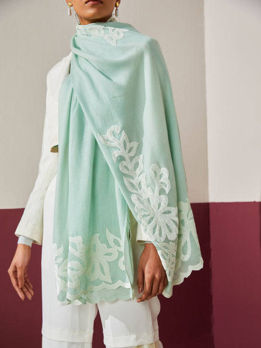 Model is wearing a mint Velvet affair cashmere stole with white applique from Shaza.