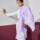 Model is wearing a lavender Velvet affair cashmere stole with white applique from Shaza.