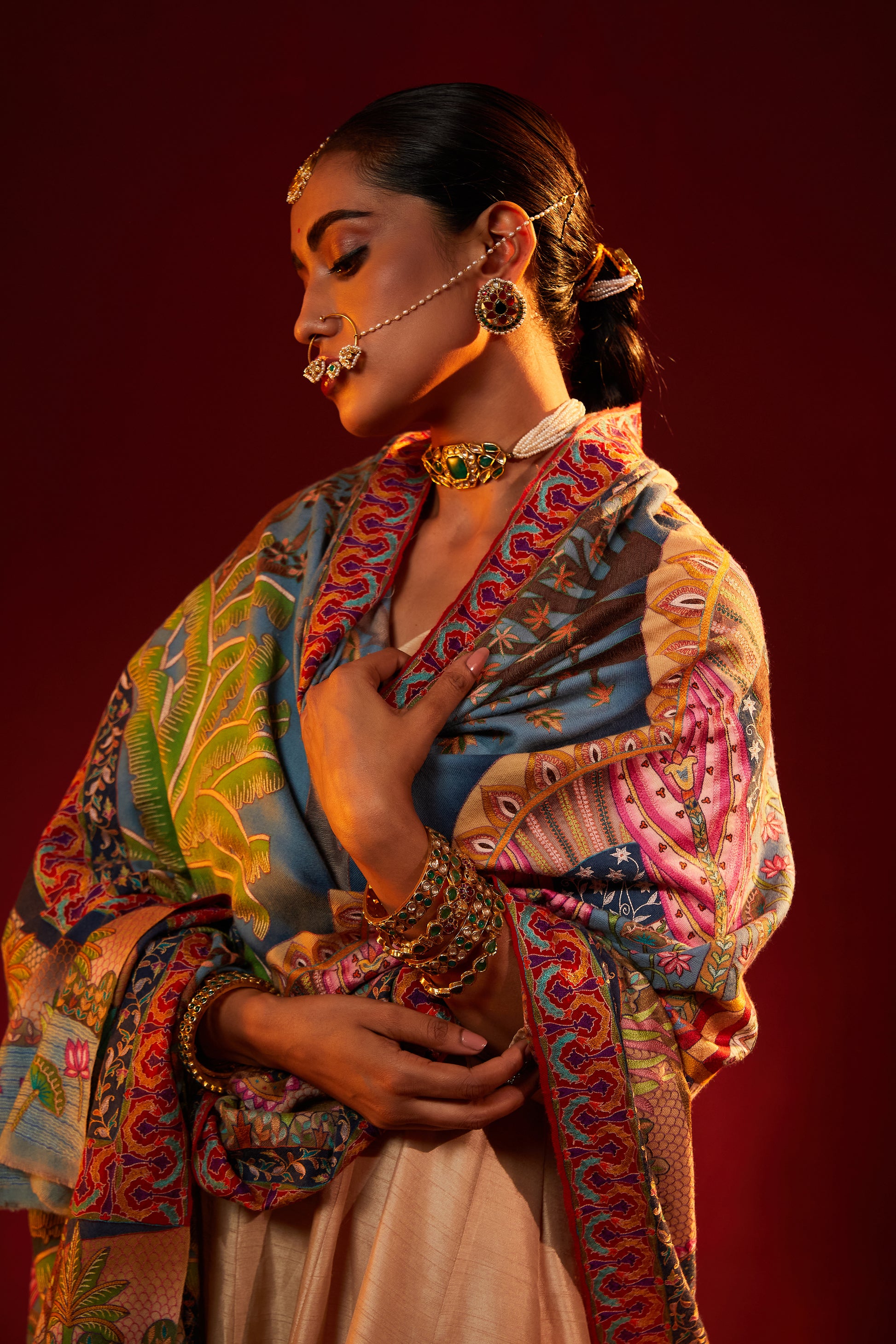 Model is wearing Nathdwaraji Pashmina Shawl from shaza.