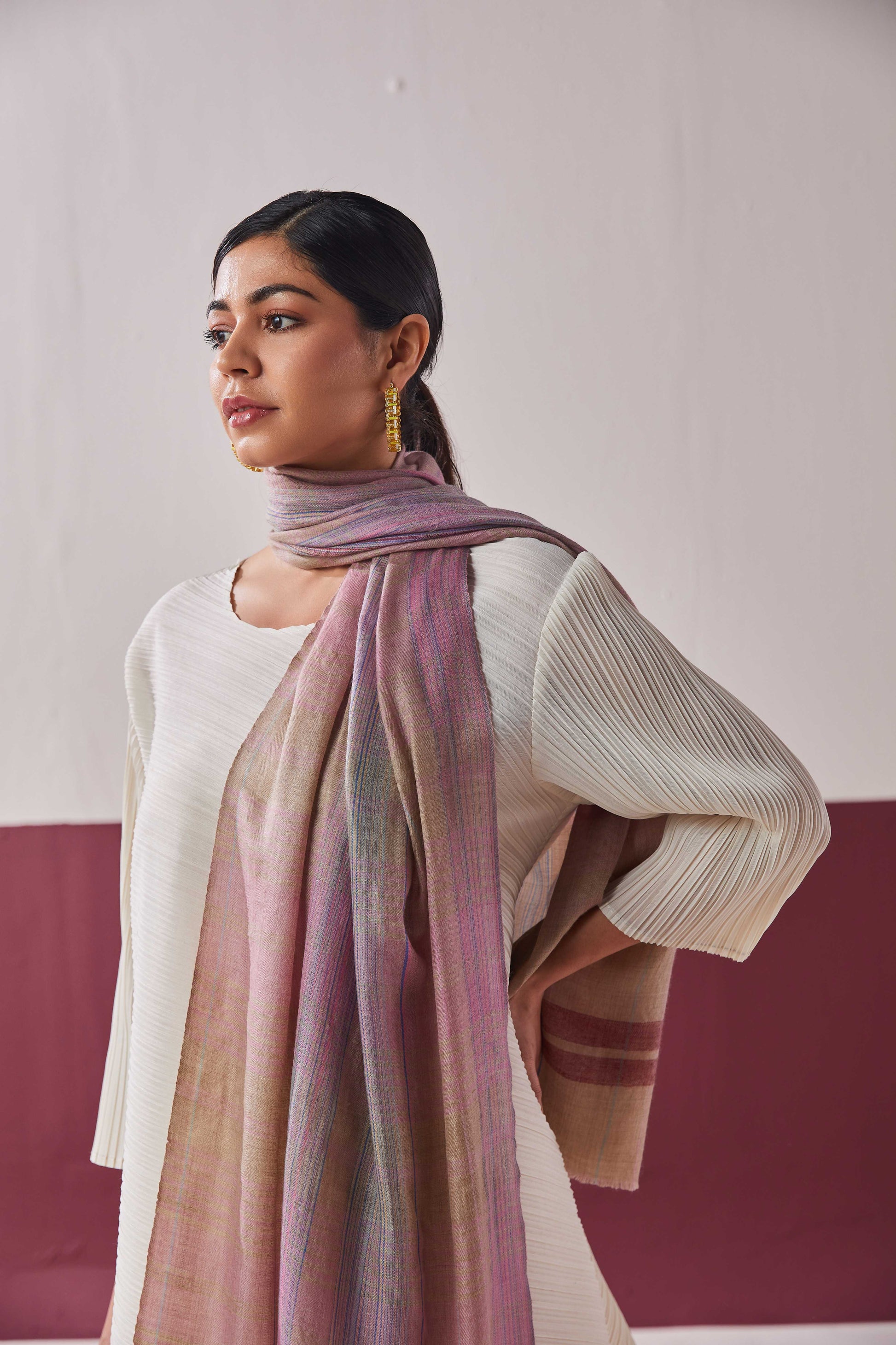 Model is wearing a pashmina striped stole from Shaza.