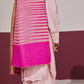 Model is wearing an Ekkat reversible stole in rani pink from Shaza.